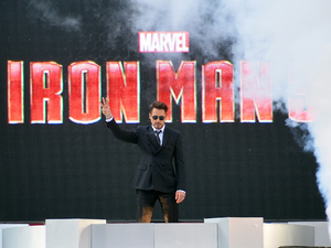 Robert Downey Jr makes an entrance at the 'iron Man 3' premiere in London