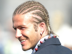 David Beckham, hair, braids, 2003, England Football Team In South Africa. England Captain David Beckham With His Latest Hairstyle (braided) Smiling As He Arrives In South Africa Where He Will Meet Nelson Mandela. 
