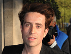The BBC Radio 1 presenter dismisses any animosity between himself and the singer.