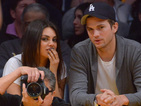 The couple and Mila Kunis's parents take in a stage play in London.