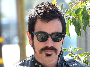 Ewan McGregor, unrecognisable, new look, dark hair, LA, motorbike, handlebar moustache 