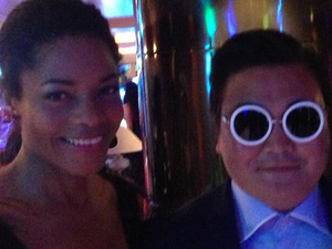 Naomie Harris poses with a fake Psy