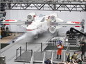 Thousands gather in New York City's Times Square to watch the unveiling of the world's largest LEGO Model, a 1:1 replica of the LEGO Star Wars X-wing Starfighter that took 32 Model Builders, 5.3 million LEGO bricks and over 17,000 hours to complete, Thursday May 23, 2013.