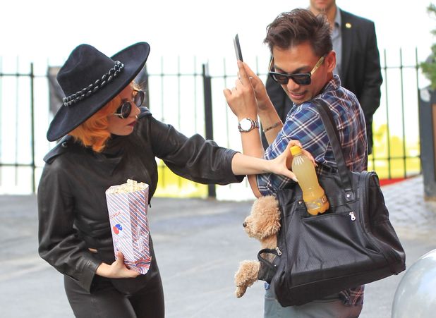 Lady GaGa, popcorn, dog, assistant, Bucharest, Romania - 17 Aug 2012