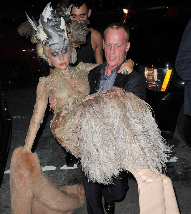 Lady GaGa carried by her minder, photo shoot by Annie Leibovitz, New York, America - 12 Sep 2011
