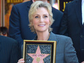The actress is accompanied by Glee creator Ryan Murphy.