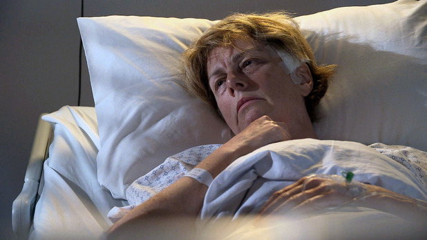 Karen wakes up confused in hospital