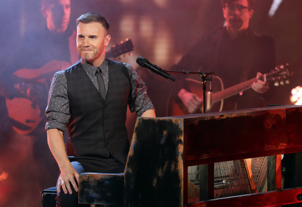 Gary Barlow leaves the judging panel to perform his new single.
