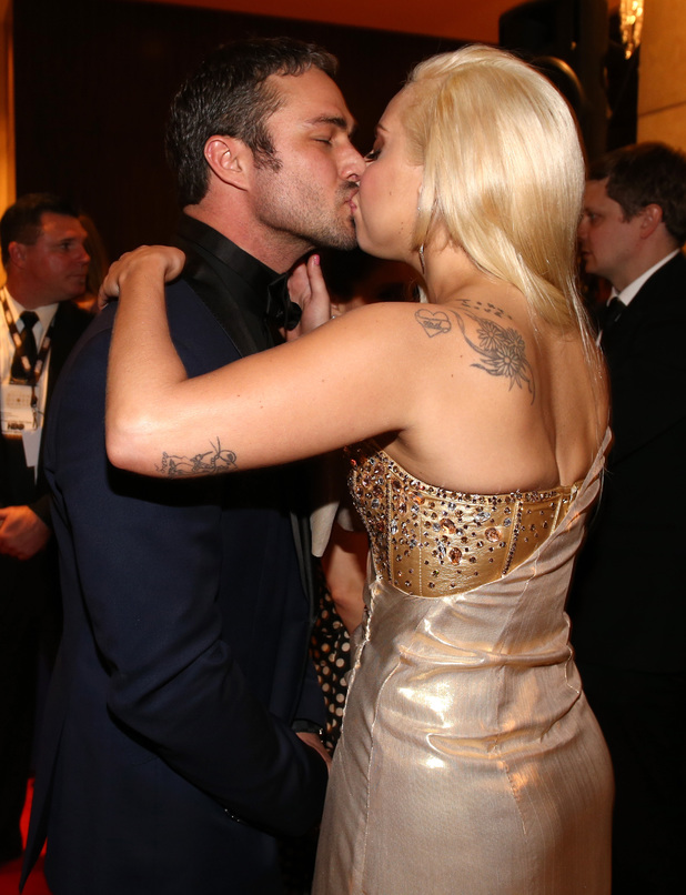 BEVERLY HILLS, CA - JANUARY 12: 71st ANNUAL GOLDEN GLOBE AWARDS -- Pictured: (l-r) Actor Taylor Kinney and singer Lady Gaga attend NBC Universal's Golden Globes Post-Party Sponsored by Fiat and Hilton held at the Beverly Hilton Hotel on January 12, 2014 -- (Photo by Christopher Polk/NBC/NBC via Getty Images) 