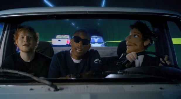 Ed, Pharrell and erm, Ed again in the music video for 'Sing'