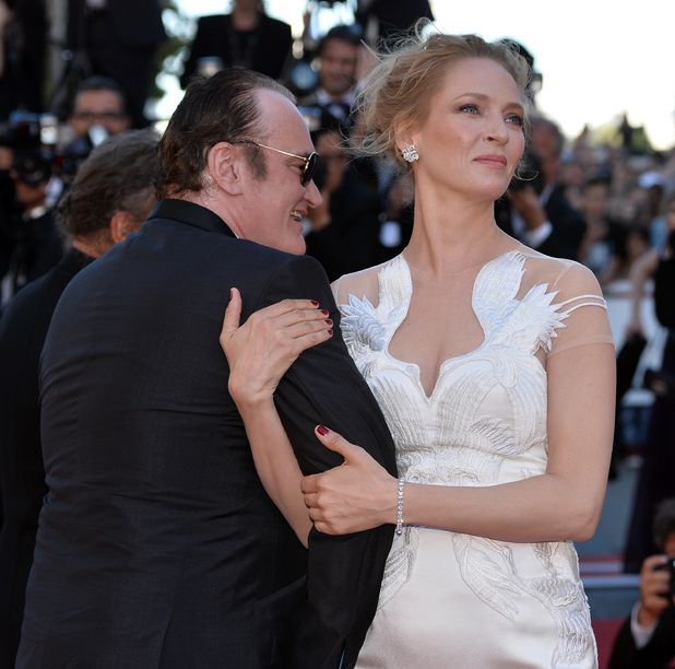 CANNES, FRANCE - MAY 24: US actress Uma Thurman (R) and US director Quentin Tarantino (L) attend the 'Per un pugno di dollari' (A Fistful of Dollars) film screening and the Closing Ceremony of the 67th Cannes Film Festival in Cannes, France on May 24, 2014. (Photo by Mustafa Yalcin/Anadolu Agency/Getty Images)
