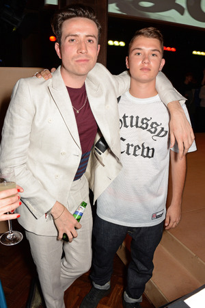 LONDON, ENGLAND - JUNE 15: Nick Grimshaw (L) and Rafferty Law attend the Esquire & DKNY MEN official opening night party for London Collections: Men at one Embankment on June 15, 2014 in London, England. (Photo by David M. Benett/Getty Images for DKNY)