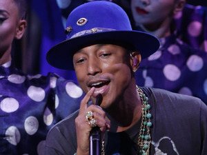 Pharrell Williams performs on the first results show of The X Factor 2014