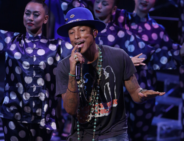 Pharrell Williams performs on the first results show of The X Factor 2014