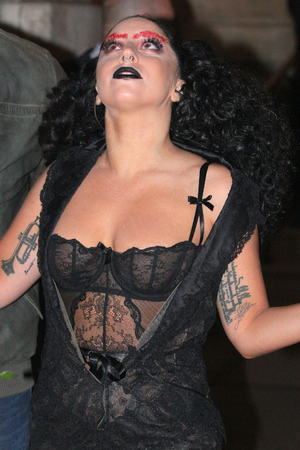 LONDON, UNITED KINGDOM - OCTOBER 22: Lady Gaga leaving the Langham hotel on October 22, 2014 in London, England. (Photo by Mark Robert Milan/GC Images)