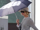 Jennifer Lawrence sends message to the paparazzi with amazing umbrella