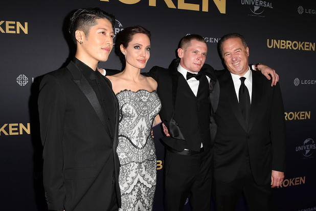 SYDNEY, AUSTRALIA - NOVEMBER 17: (L-R) Miyavi Ishihara, Angelina Jolie, Jack O'Connell and Matthew Baer arrive at the world premiere of Unbroken at the State Theatre on November 17, 2014 in Sydney, Australia. (Photo by Brendon Thorne/Getty Images)