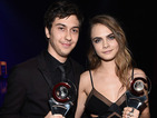 The actress collected the prize along with Paper Towns co-star Nat Wolff.