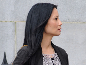 Lucy Liu and Johnny Lee Miller filming on set for 'Elementary' pilot series in New York
