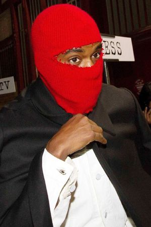 Kanye West wears bizarre red balaclava at Paris Fashion Week - pictures ...